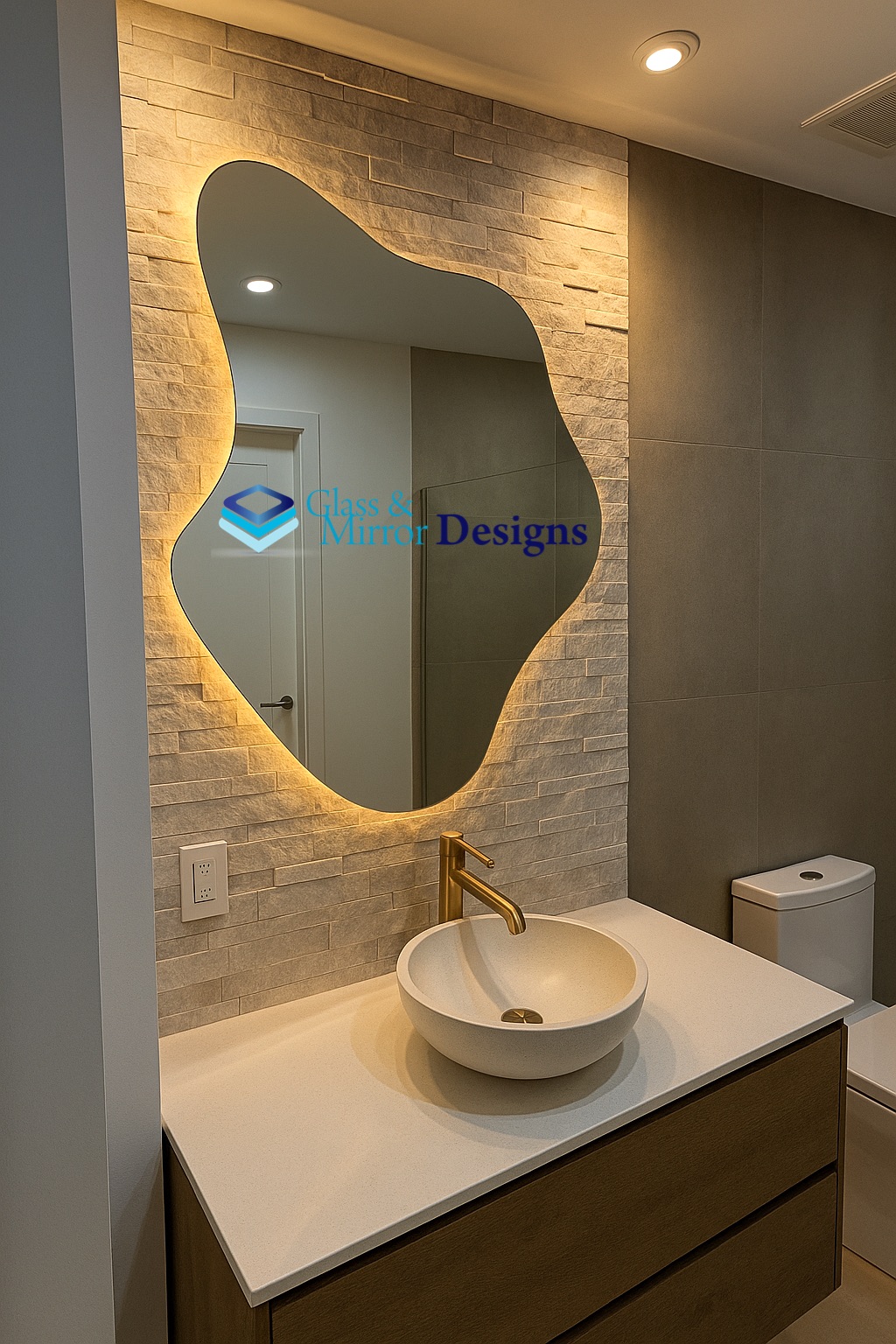 Organic shape LED backlit vanity mirror over single sink