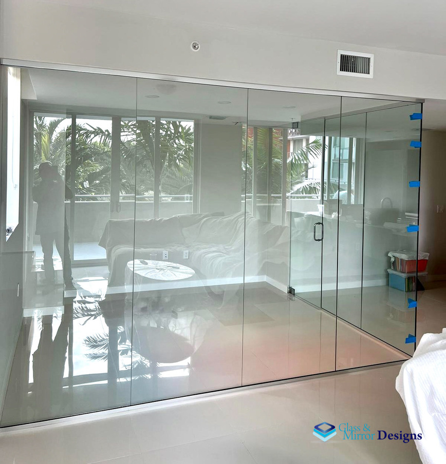 Frameless glass wall in residential space