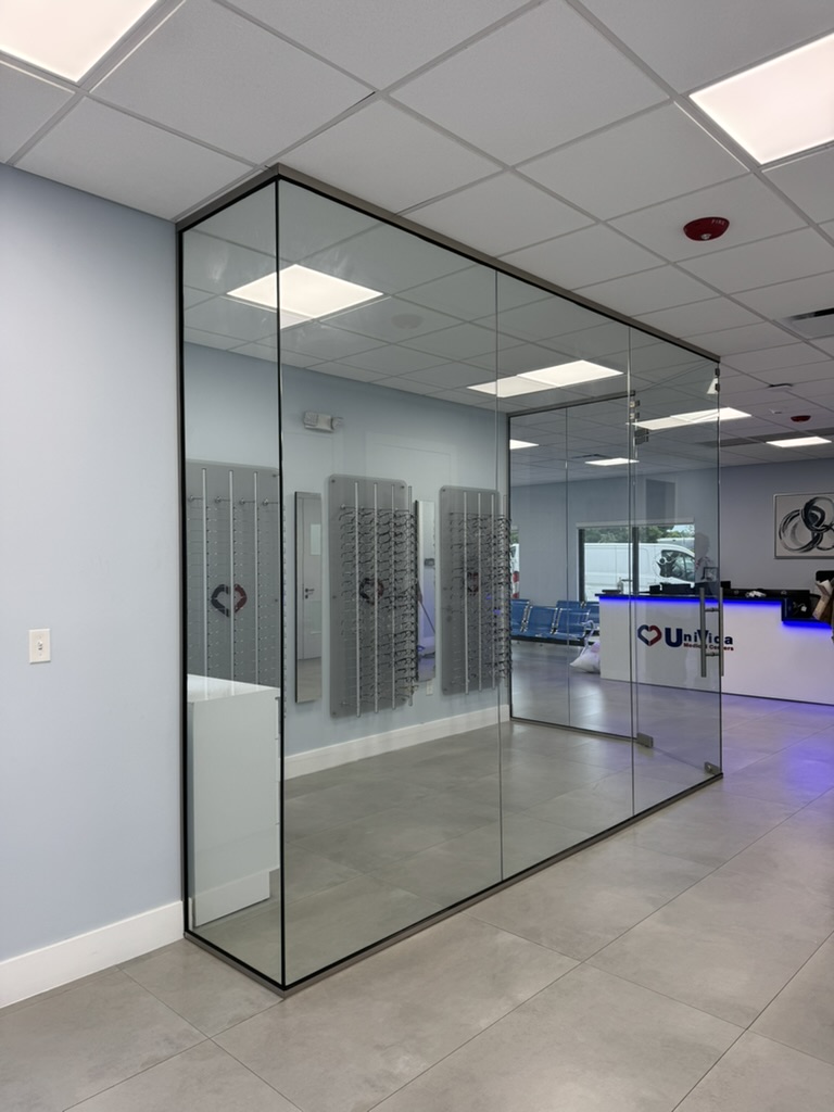Glass office partitions in retail space